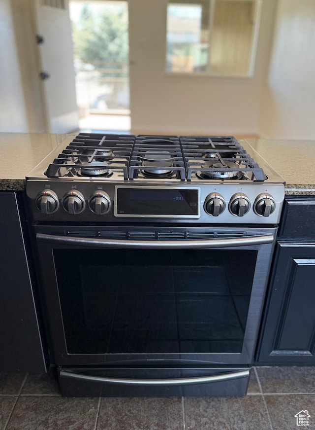 650 N 300 W Unit 234, Salt Lake City, UT 84103 - kitchen featuring light countertops and gas stove