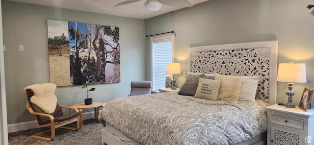 carpeted bedroom featuring baseboards and ceiling fan