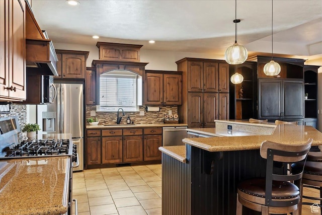 kitchen with a sink, open shelves, a kitchen bar, a center island, and stainless steel appliances
