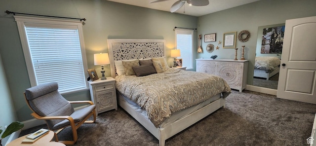 carpeted bedroom with baseboards and ceiling fan