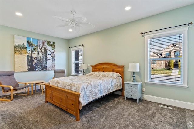 carpeted bedroom featuring baseboards, visible vents, ceiling fan, and recessed lighting