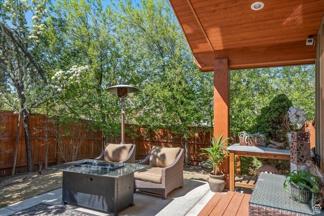 3594 E 3800 S, Salt Lake City, UT 84109 - deck featuring an outdoor fire pit, outdoor dining space, fence, and a patio