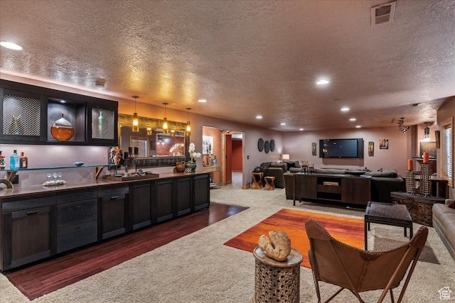 3594 E 3800 S, Salt Lake City, UT 84109 - bar featuring visible vents, a textured ceiling, recessed lighting, pendant lighting, and carpet flooring
