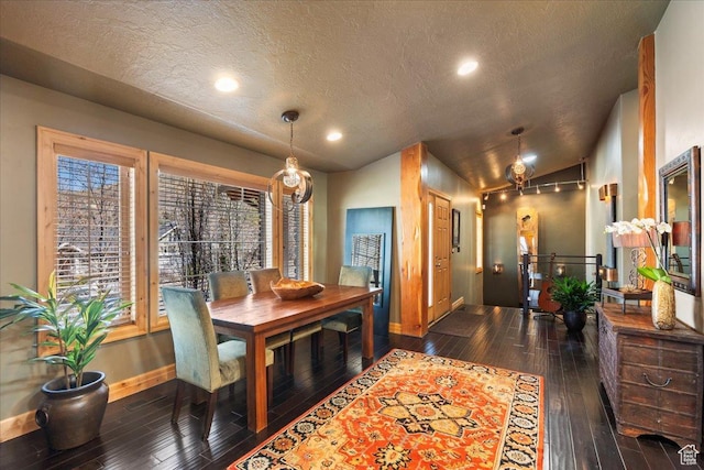 3594 E 3800 S, Salt Lake City, UT 84109 - dining room featuring wood-type flooring, baseboards, a textured ceiling, and lofted ceiling