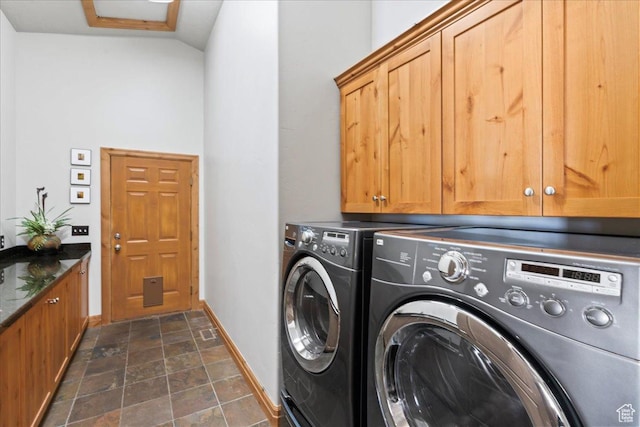 3594 E 3800 S, Salt Lake City, UT 84109 - laundry room with cabinet space, independent washer and dryer, baseboards, and stone finish flooring