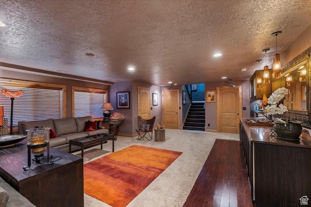 3594 E 3800 S, Salt Lake City, UT 84109 - carpeted living room featuring stairs, a textured ceiling, and baseboards
