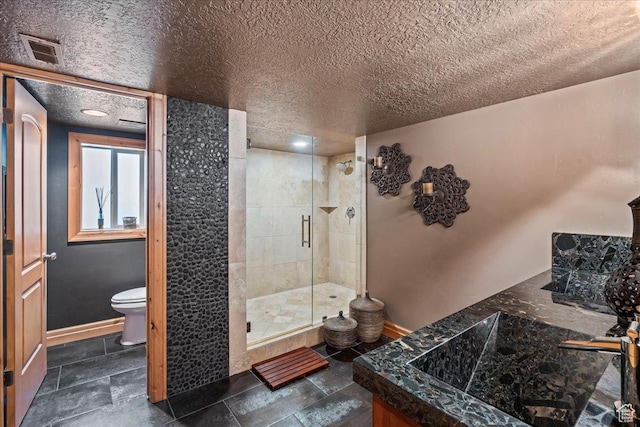 3594 E 3800 S, Salt Lake City, UT 84109 - bathroom featuring baseboards, a textured ceiling, toilet, a shower stall, and visible vents