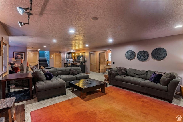 3594 E 3800 S, Salt Lake City, UT 84109 - carpeted living area with bar area, recessed lighting, stairway, and a textured ceiling