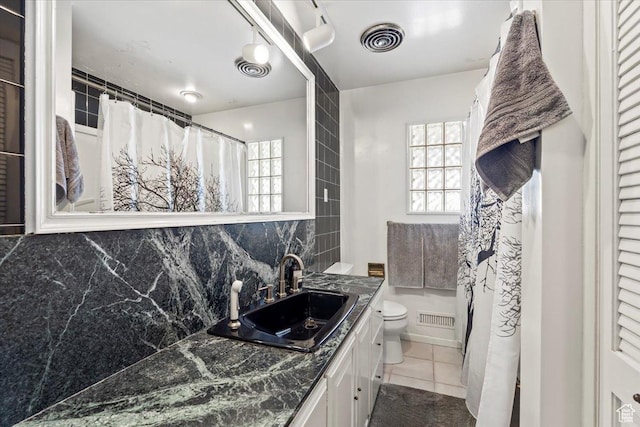 full bathroom with visible vents, tasteful backsplash, toilet, and tile patterned flooring
