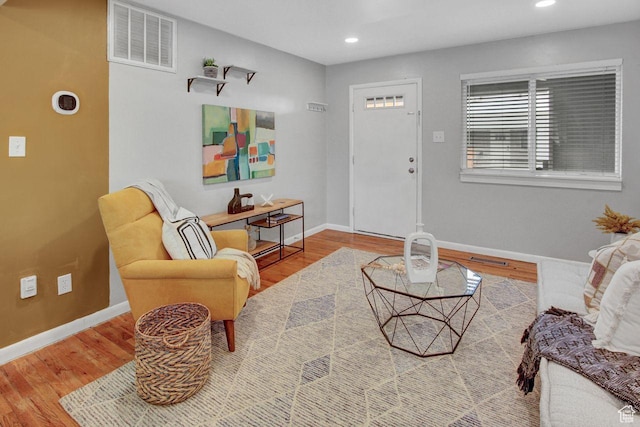650 N 300 W Unit 202, Salt Lake City, UT 84103 - living area featuring wood finished floors, recessed lighting, baseboards, and visible vents
