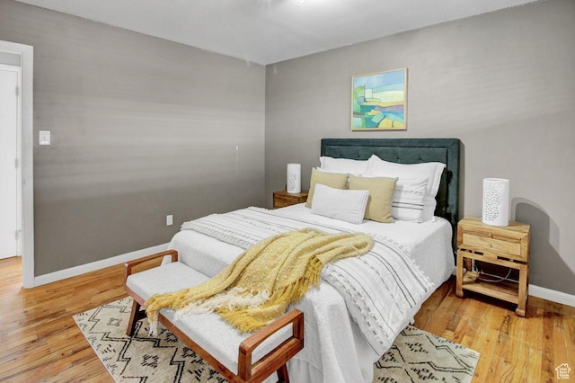 650 N 300 W Unit 202, Salt Lake City, UT 84103 - bedroom with baseboards and wood finished floors