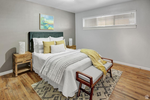 650 N 300 W Unit 202, Salt Lake City, UT 84103 - bedroom featuring hardwood / wood-style flooring and baseboards
