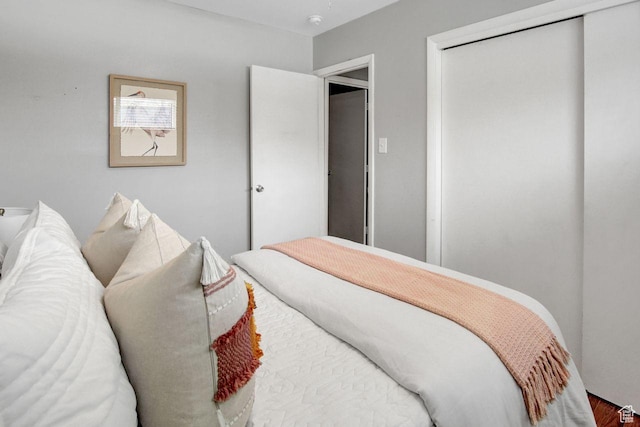 650 N 300 W Unit 202, Salt Lake City, UT 84103 - bedroom featuring a closet and wood finished floors