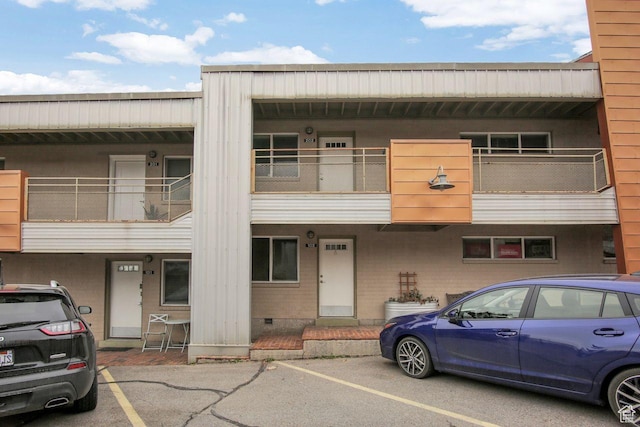650 N 300 W Unit 202, Salt Lake City, UT 84103 - view of property featuring uncovered parking