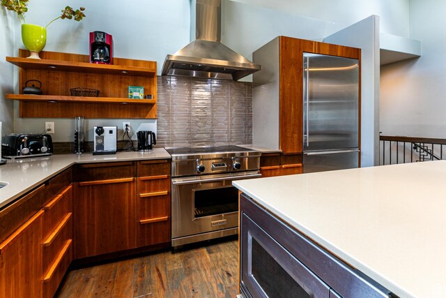 kitchen featuring island range hood, open shelves, high end appliances, and dark wood finished floors