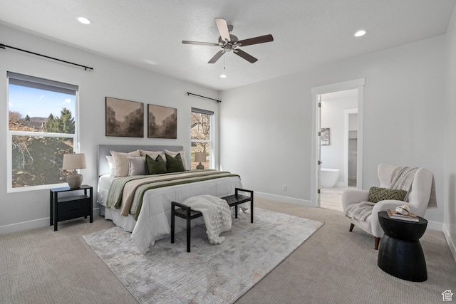 bedroom featuring baseboards, recessed lighting, and light colored carpet