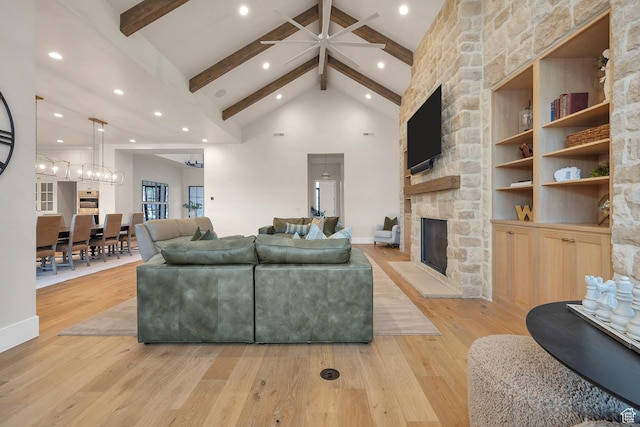 775 W 1300 S, Hurricane, UT 84737 - living area with beamed ceiling, light wood-type flooring, ceiling fan, a fireplace, and recessed lighting