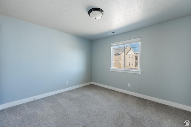 607 N Glenwilde Rd Unit 116, Vineyard, UT 84059 - carpeted spare room with baseboards, a textured ceiling, and visible vents