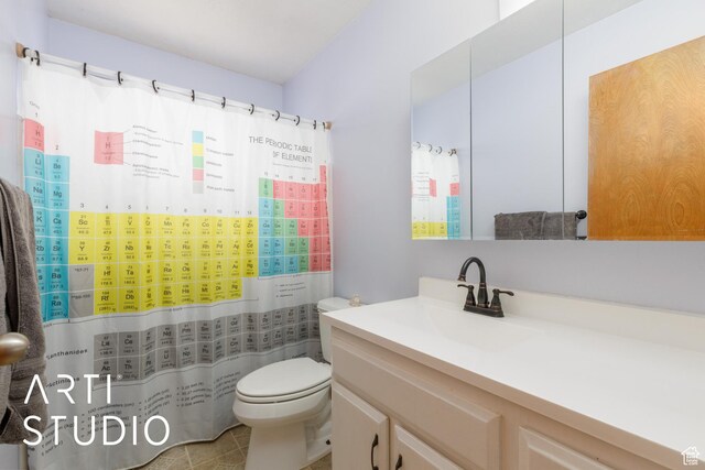 1454 E Harrop St, Ogden, UT 84404 - bathroom featuring toilet, vanity, tile patterned flooring, and a shower with curtain