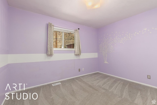 1454 E Harrop St, Ogden, UT 84404 - unfurnished room featuring baseboards, carpet, and visible vents