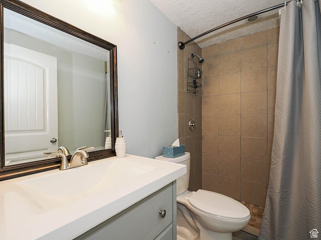 2291 E Ox Yoke Dr N, Eagle Mountain, UT 84005 - full bath featuring a tile shower, toilet, vanity, and a textured ceiling