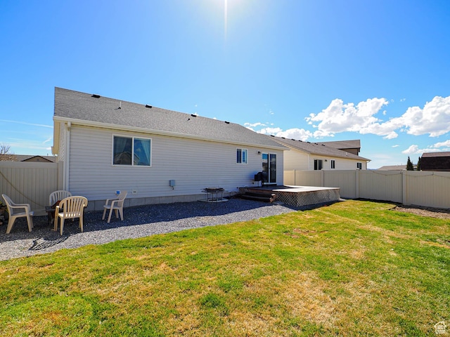 2291 E Ox Yoke Dr N, Eagle Mountain, UT 84005 - rear view of property featuring fence, a yard, and a patio area