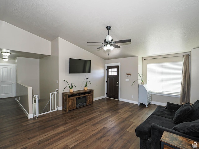 2291 E Ox Yoke Dr N, Eagle Mountain, UT 84005 - living room with vaulted ceiling, a textured ceiling, dark wood finished floors, baseboards, and ceiling fan