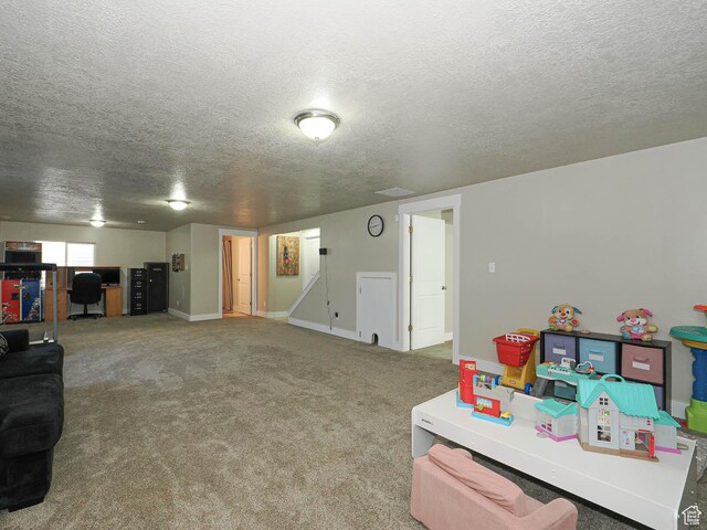 2291 E Ox Yoke Dr N, Eagle Mountain, UT 84005 - playroom with baseboards, carpet, and a textured ceiling