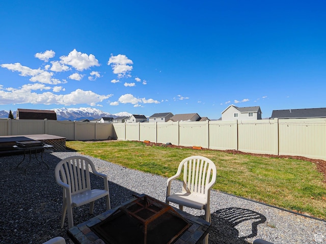 2291 E Ox Yoke Dr N, Eagle Mountain, UT 84005 - view of yard with a fenced backyard and a patio