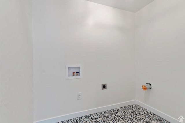 washroom featuring hookup for an electric dryer, baseboards, laundry area, and washer hookup
