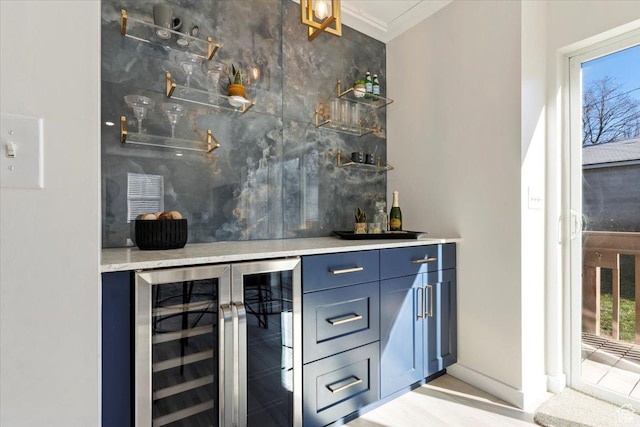 bar with a dry bar and beverage cooler