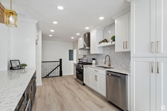kitchen with wall chimney exhaust hood, stainless steel appliances, tasteful backsplash, a sink, and open shelves
