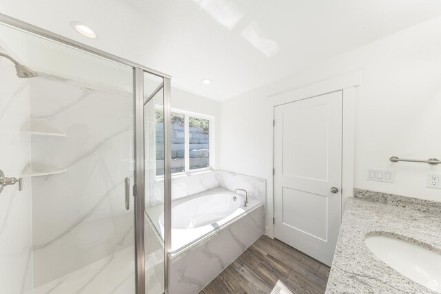64 N Bywater Way, Brigham City, UT 84302 - bathroom featuring a marble finish shower, a bath, wood finished floors, vanity, and recessed lighting