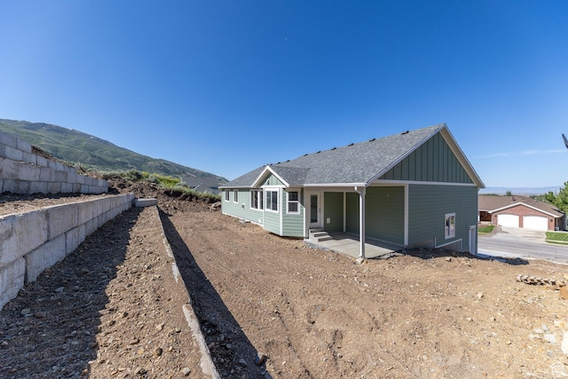64 N Bywater Way, Brigham City, UT 84302 - back of property featuring board and batten siding and a shingled roof