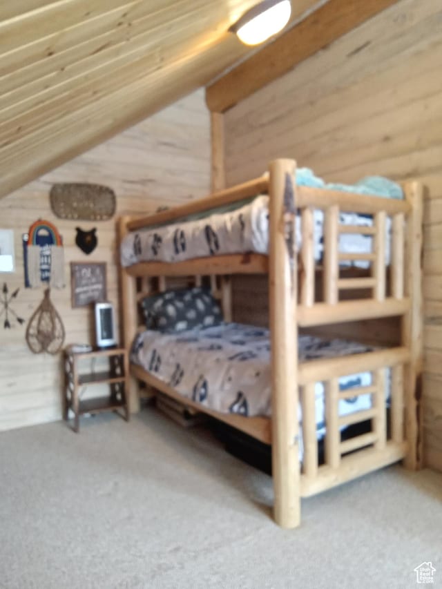 2204 S Timber Lakes Dr S Unit 945, Heber City, UT 84032 - unfurnished bedroom with carpet, wood walls, and vaulted ceiling