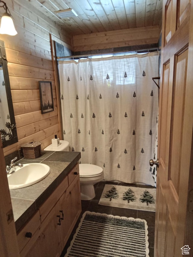 2204 S Timber Lakes Dr S Unit 945, Heber City, UT 84032 - full bathroom featuring wood walls, toilet, vanity, a shower with curtain, and wooden ceiling