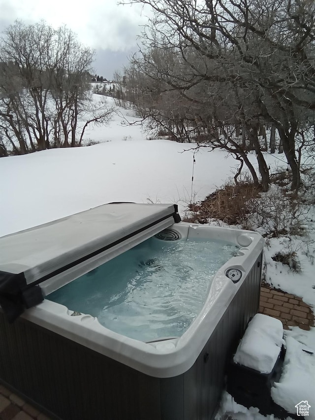 2204 S Timber Lakes Dr S Unit 945, Heber City, UT 84032 - yard covered in snow featuring a hot tub