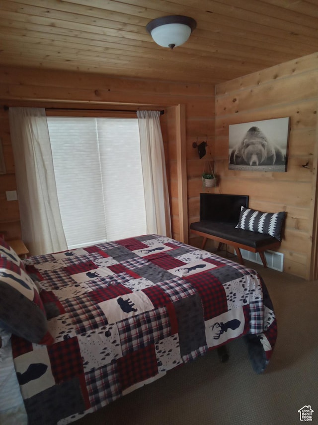 2204 S Timber Lakes Dr S Unit 945, Heber City, UT 84032 - carpeted bedroom with wooden ceiling and wood walls