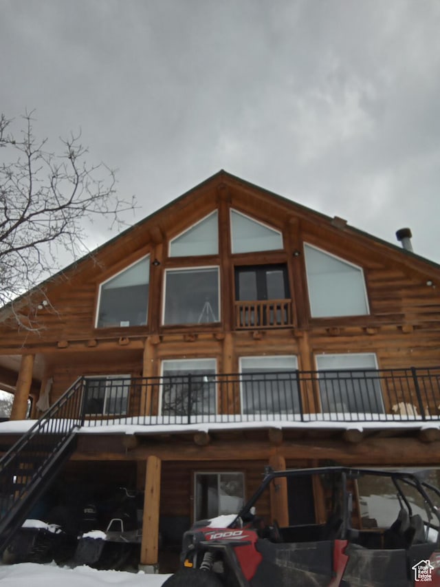 2204 S Timber Lakes Dr S Unit 945, Heber City, UT 84032 - snow covered building featuring stairs
