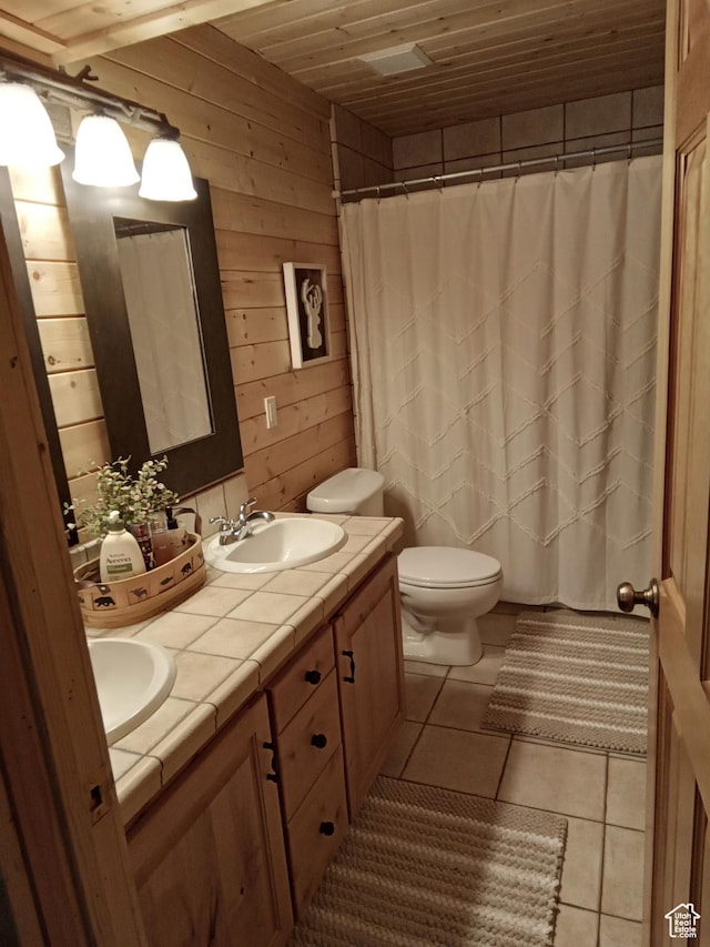 2204 S Timber Lakes Dr S Unit 945, Heber City, UT 84032 - bathroom with toilet, tile patterned floors, a sink, and double vanity