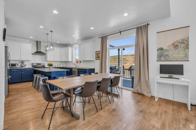 2685 E White Birch Dr, Eagle Mountain, UT 84005 - dining area featuring light wood-type flooring and recessed lighting