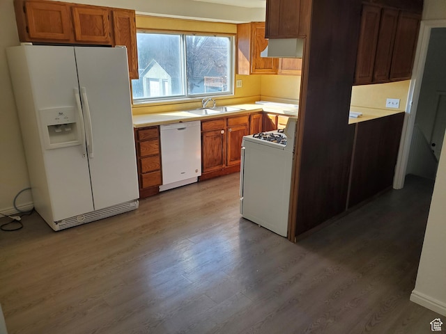397 E 200 N, Kaysville, UT 84037 - kitchen featuring light countertops, white appliances, wood finished floors, brown cabinets, and a sink
