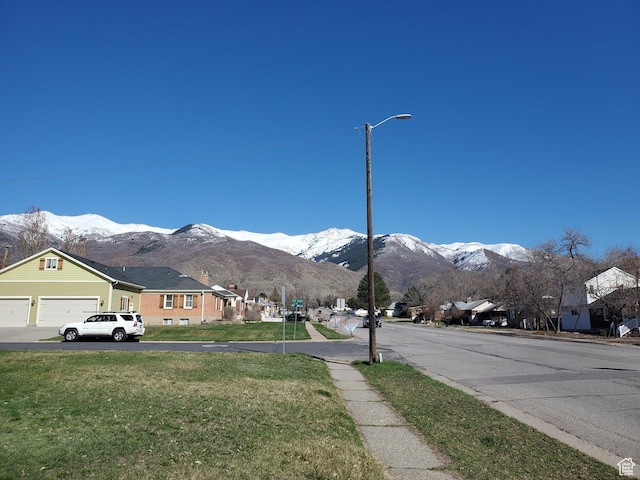 397 E 200 N, Kaysville, UT 84037 - view of street with a residential view, curbs, sidewalks, street lighting, and a mountain view