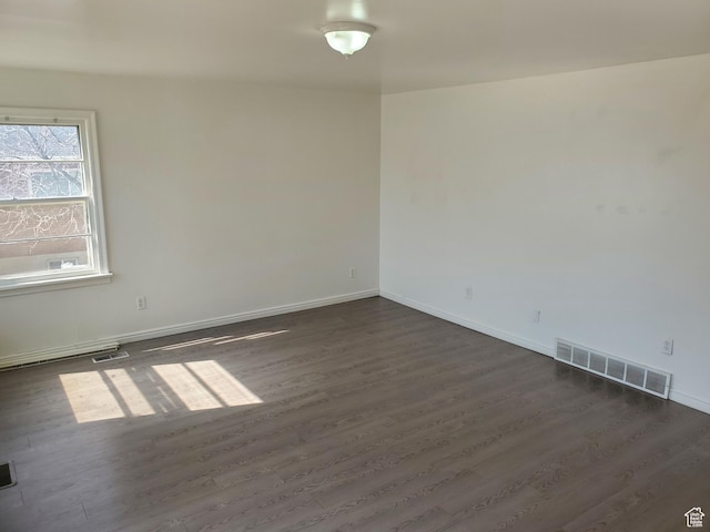 397 E 200 N, Kaysville, UT 84037 - unfurnished room featuring baseboards, dark wood-style floors, and visible vents