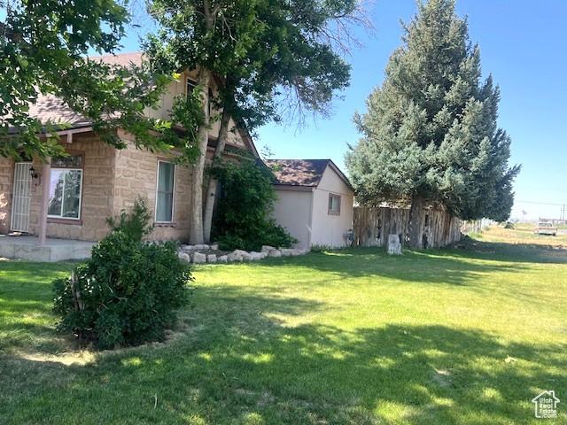 316 W 500 N, Beaver, UT 84713 - view of side of home with stone siding
