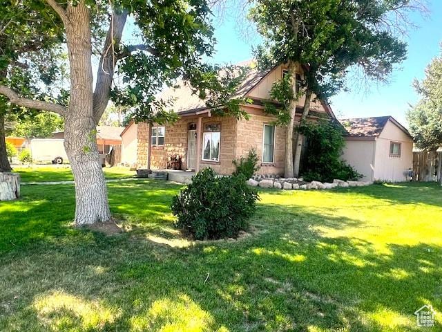 316 W 500 N, Beaver, UT 84713 - view of front of property featuring a front lawn and stone siding