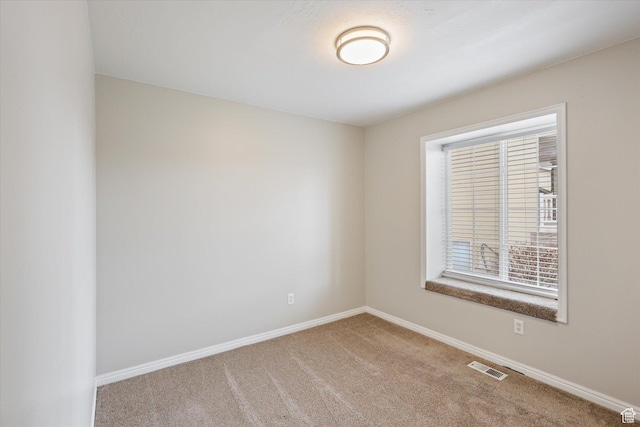 3018 S Asplund Cir, Salt Lake City, UT 84119 - spare room with carpet flooring, baseboards, and visible vents