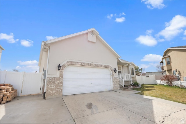 3018 S Asplund Cir, Salt Lake City, UT 84119 - view of side of property featuring a gate, fence, an attached garage, driveway, and a yard