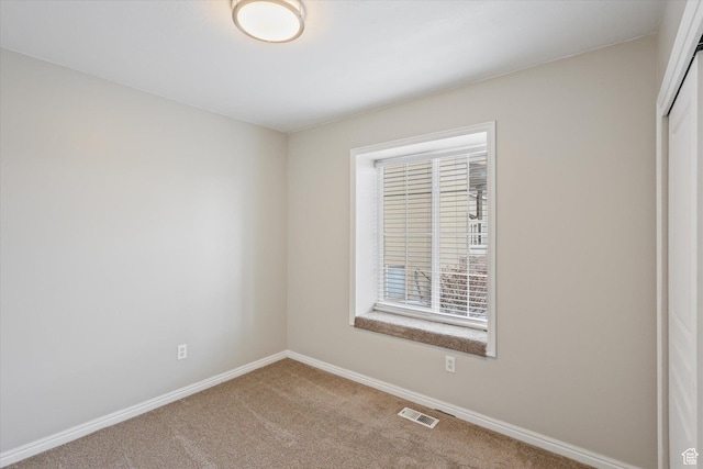 3018 S Asplund Cir, Salt Lake City, UT 84119 - carpeted spare room with baseboards and visible vents