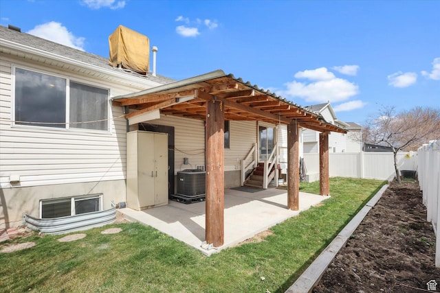 3018 S Asplund Cir, Salt Lake City, UT 84119 - rear view of house with a yard, cooling unit, fence private yard, and a patio area